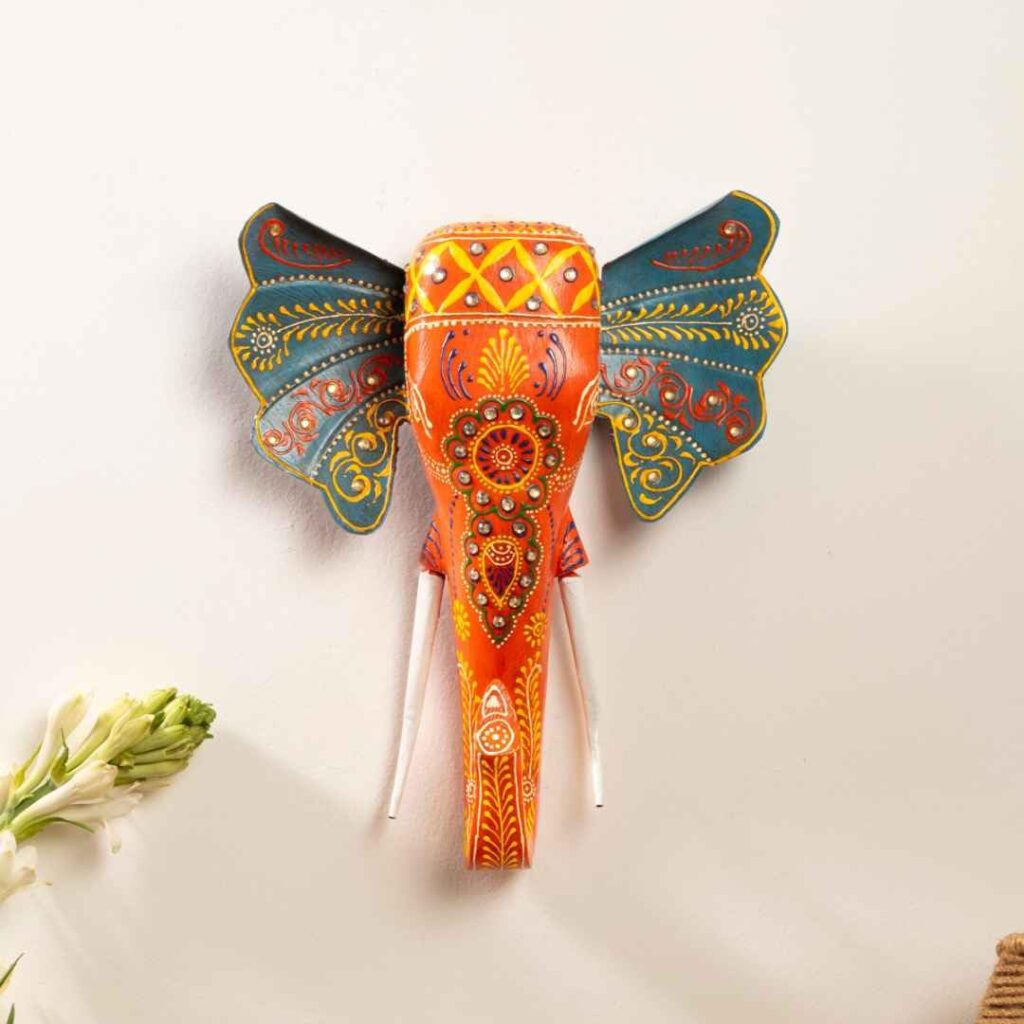 ATRANGI STUDIO Handpainted Wooden Elephant Wall Decor | Ethnic Wooden Wall Art | Symbol of Strength & Wisdom | Wall Hanging for Home, Corridor & Balcony | Ready to Hang | 11 Inch, Orange