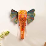 ATRANGI STUDIO Handpainted Wooden Elephant Wall Decor | Ethnic Wooden Wall Art | Symbol of Strength & Wisdom | Wall Hanging for Home, Corridor & Balcony | Ready to Hang | 11 Inch, Orange