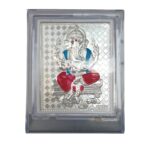 Sri Sisters 999 Silver Plated Ganesh Idol Frame for Car Dashboard, Home Temple, Office, Pooja Room | Compact Ganpati Photo with Acrylic Stand (11x8 cm, Multicolor)