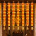 iHandikart Artificial Marigold Flower Garland with Golden Bell | 27 Inch, Pack of 10 Yellow & Orange Genda Phool Hanging for Home, Mandir, Ganesh Chaturthi, Navratri, Dussehra & Diwali Decoration